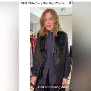 Top front is black faux fur and the rest of the vest is navy blue